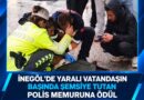 İnegöl’de yaralı vatandaşın başında şemsiye tutan polis memuruna ödül